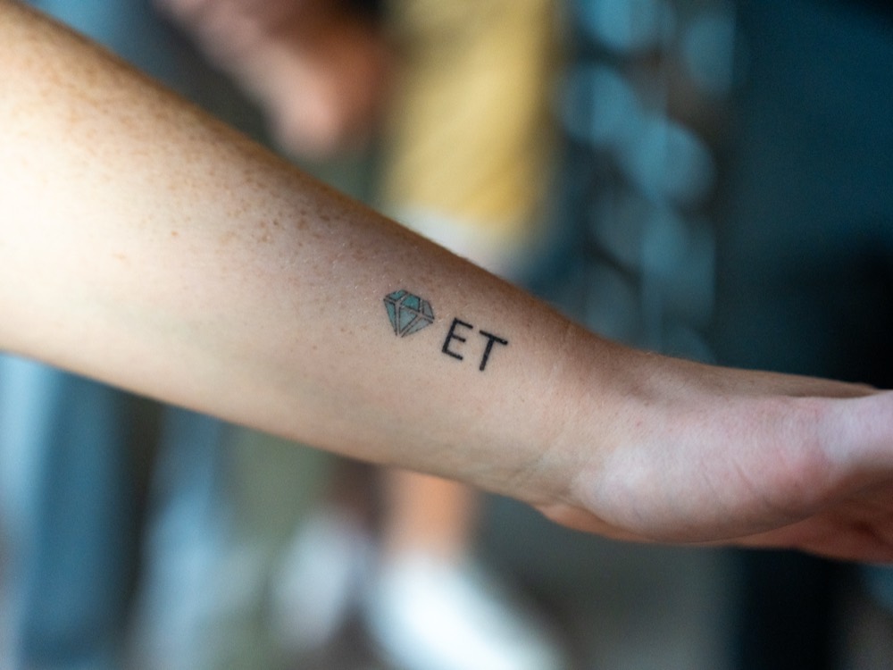 Ecom Talent tattoo
